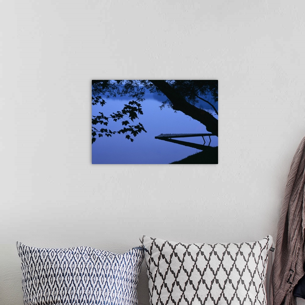 A bohemian room featuring Lake And Trees At Dusk