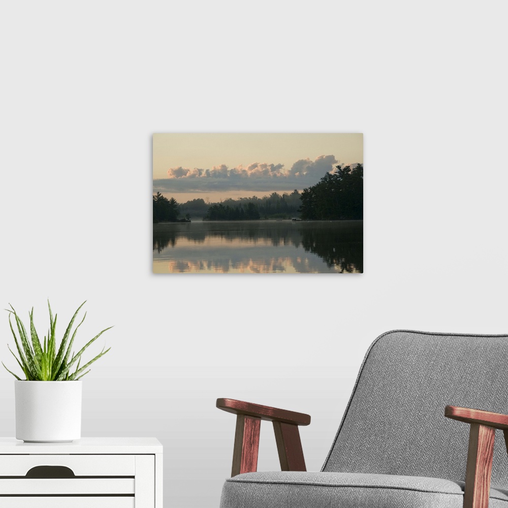 A modern room featuring Lake Of The Woods, Ontario, Canada, View Across Lake At Sunrise