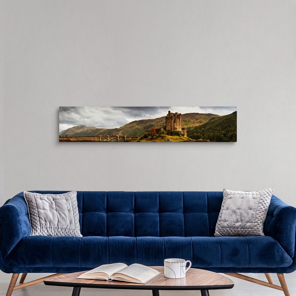 A modern room featuring Landscape With A Castle On A Hill And A Stone Bridge Over A River, Scotland