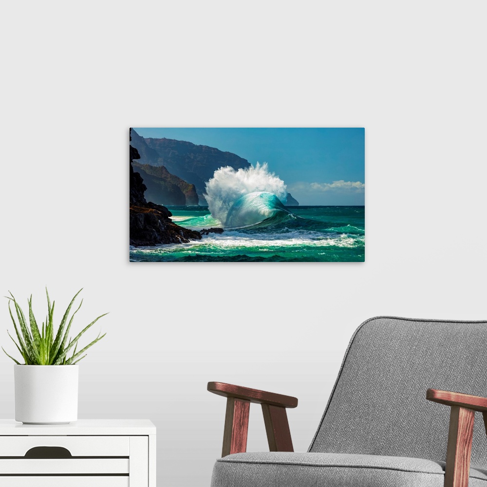A modern room featuring Large ocean wave crashes into rock along the Na Pali coast, Kauai, Hawaii, united states of America.