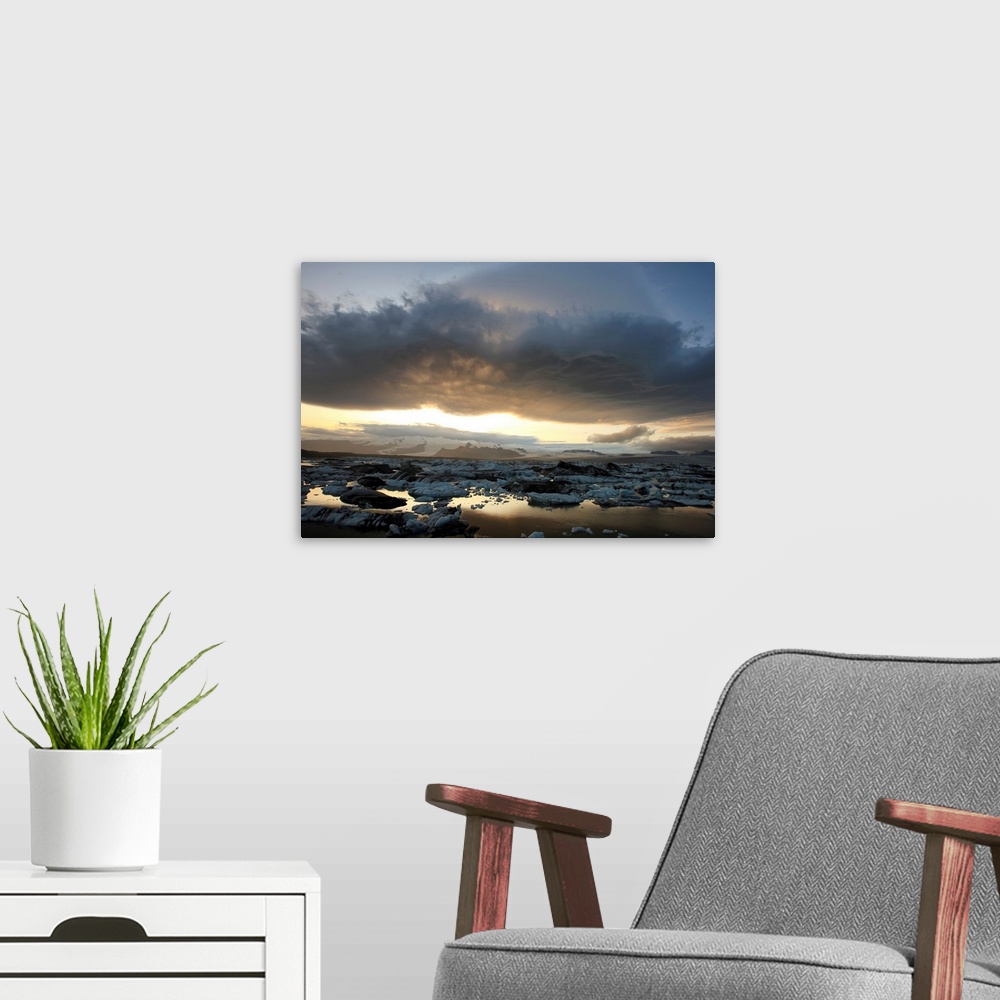 A modern room featuring Lenticular Clouds Over The Ice Lagoon Of Jokulsarlon At Sunset, Iceland