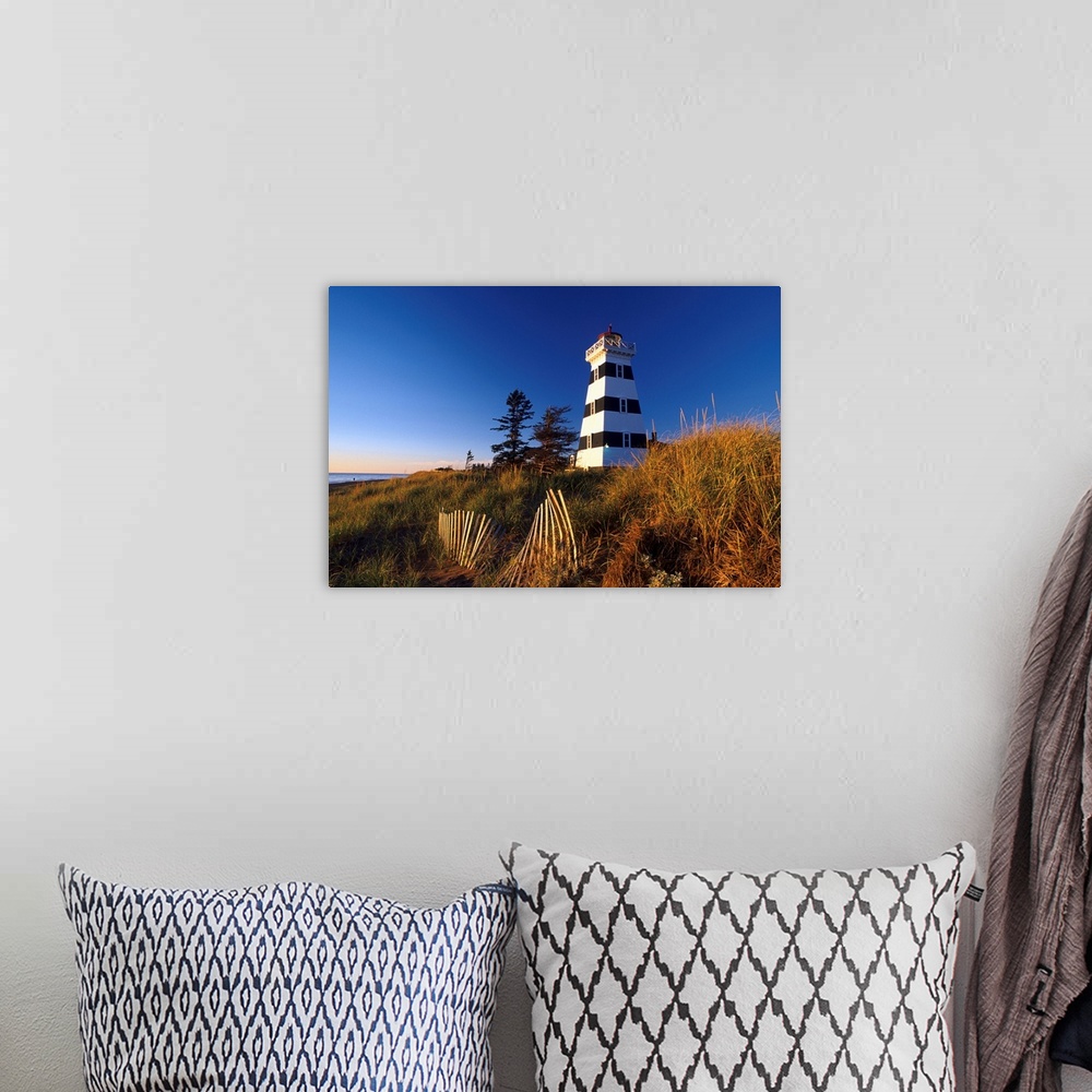 A bohemian room featuring Lighthouse, Cedar Dunes Provincial Park, Prince Edward Island, Canada