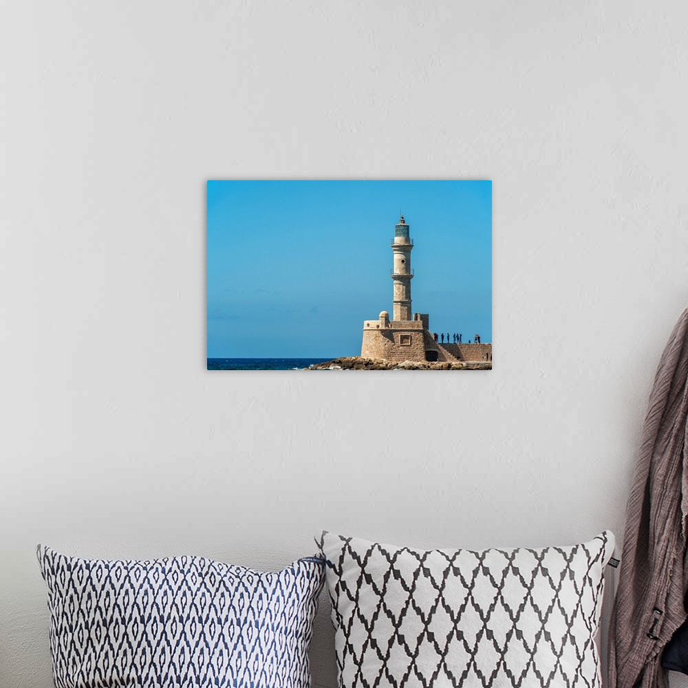 A bohemian room featuring Lighthouse in the Venetian harbour, Chania, Crete, Greece