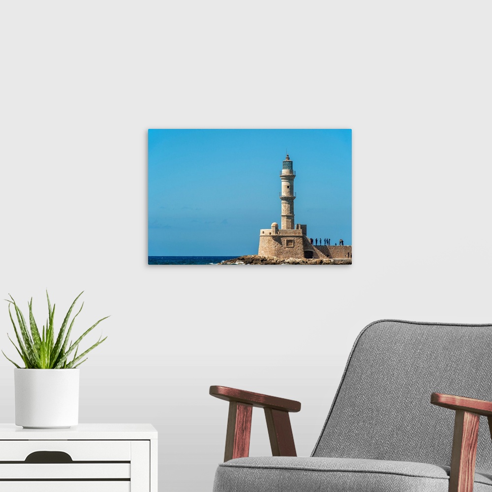 A modern room featuring Lighthouse in the Venetian harbour, Chania, Crete, Greece
