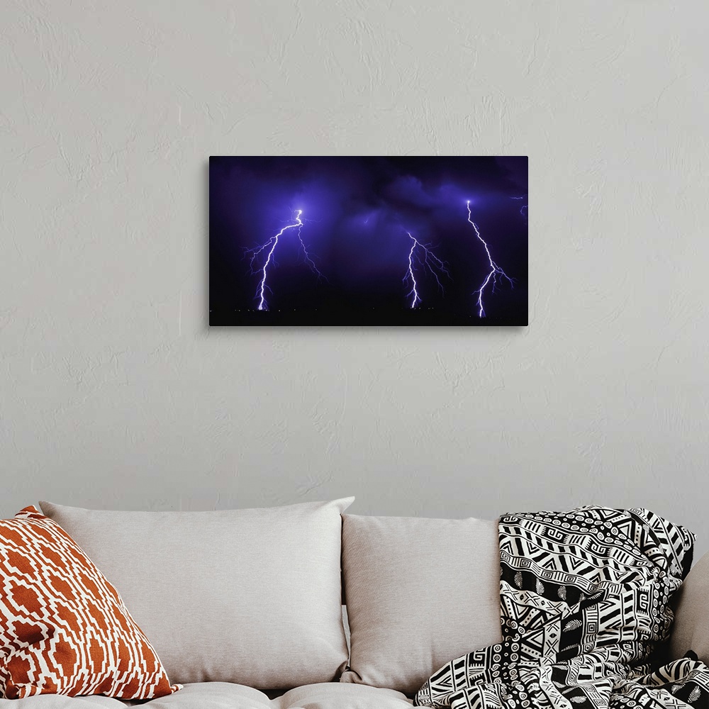 A bohemian room featuring Lightning Over City At Night