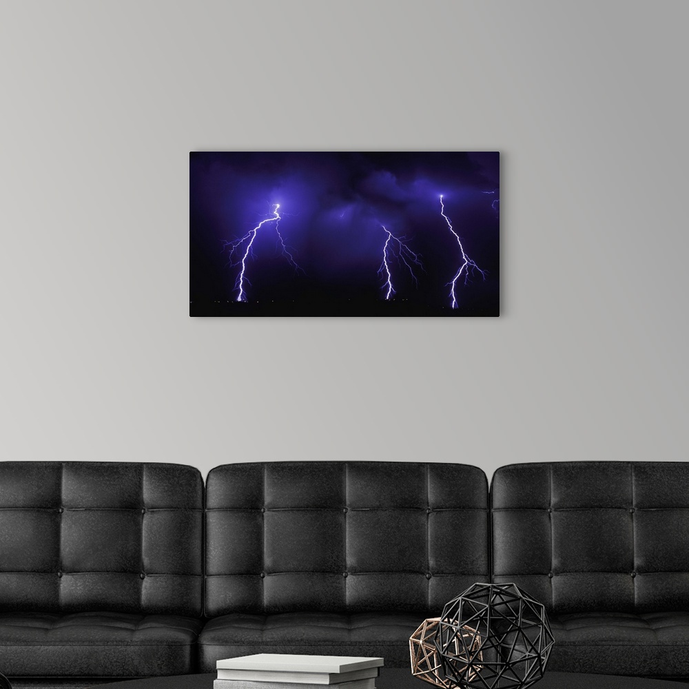 A modern room featuring Lightning Over City At Night
