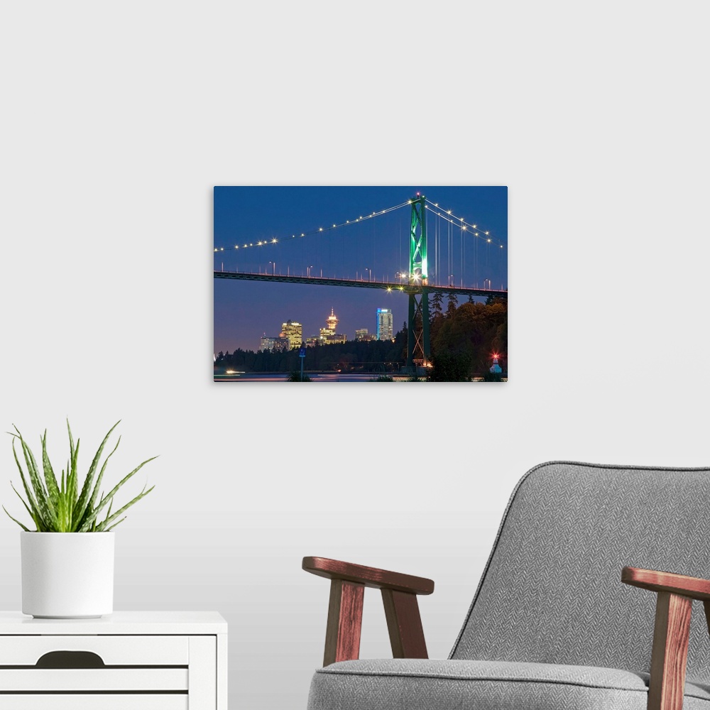 A modern room featuring Lions Gate Bridge and downtown Vancouver from Ambleside Park, West Vancouver, Canada