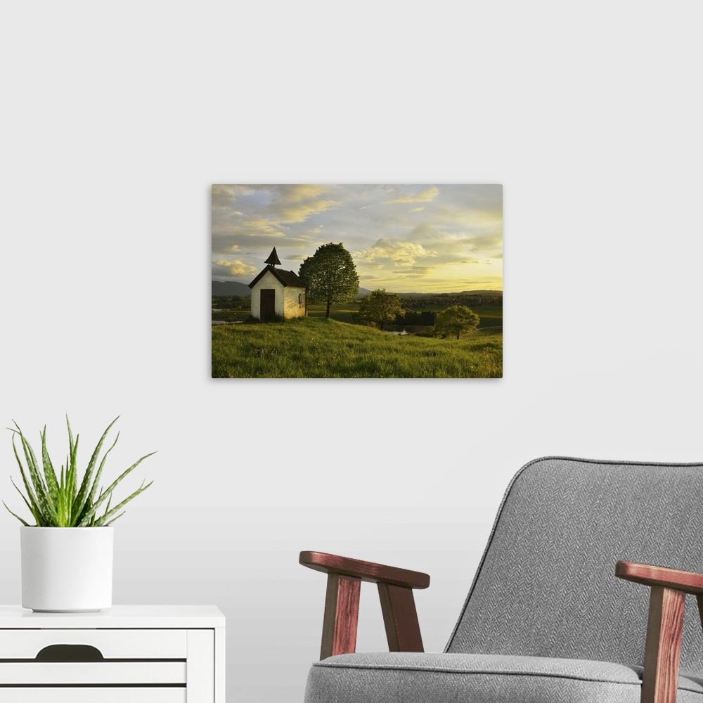 A modern room featuring Little Chapel with Tree at Sunset in Spring, Aidlinger Hohe, Bavaria, Germany