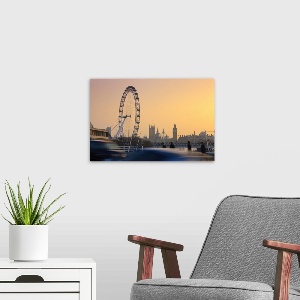 A modern room featuring London Eye and Big Ben at sunset.