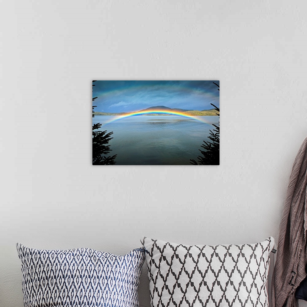 A bohemian room featuring Large landscape photograph of a rainbow over the rippling  waters of Clover Passage, in Ketchikan...