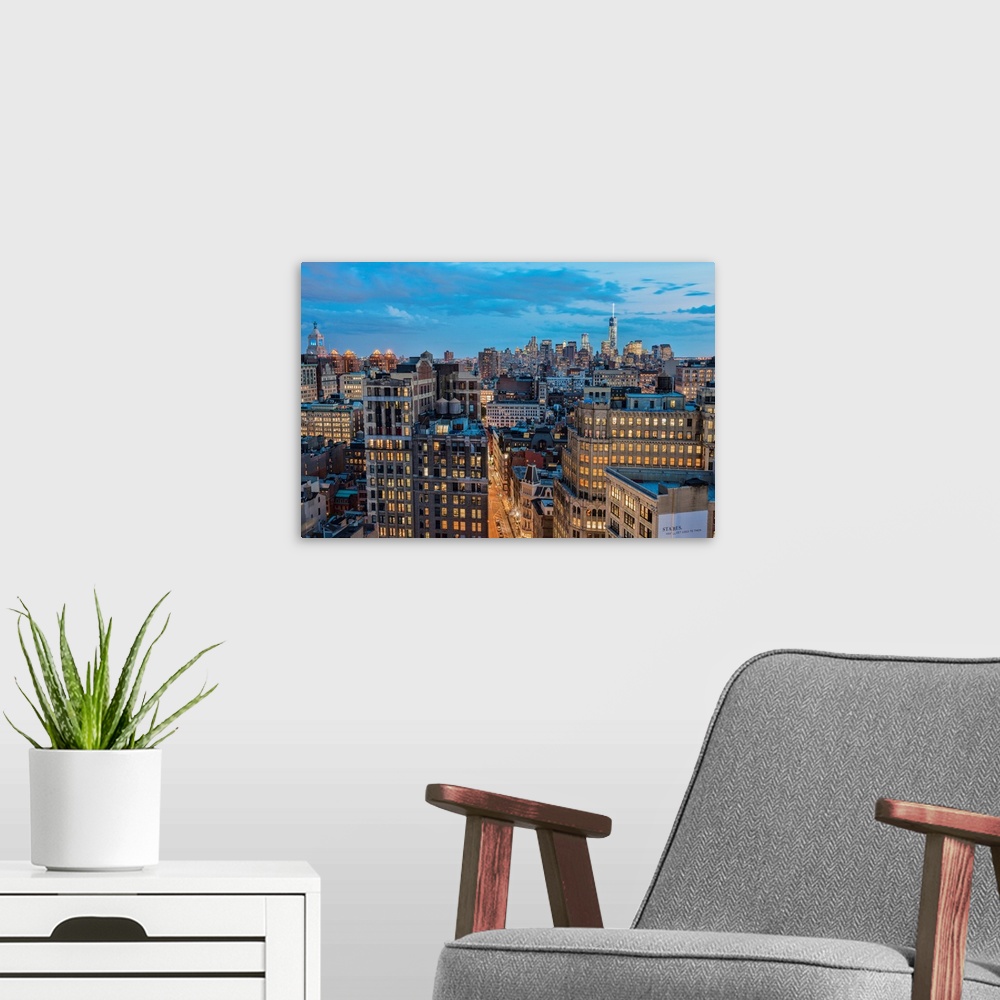 A modern room featuring Lower Manhattan at twilight, New York City, New York, United States of America