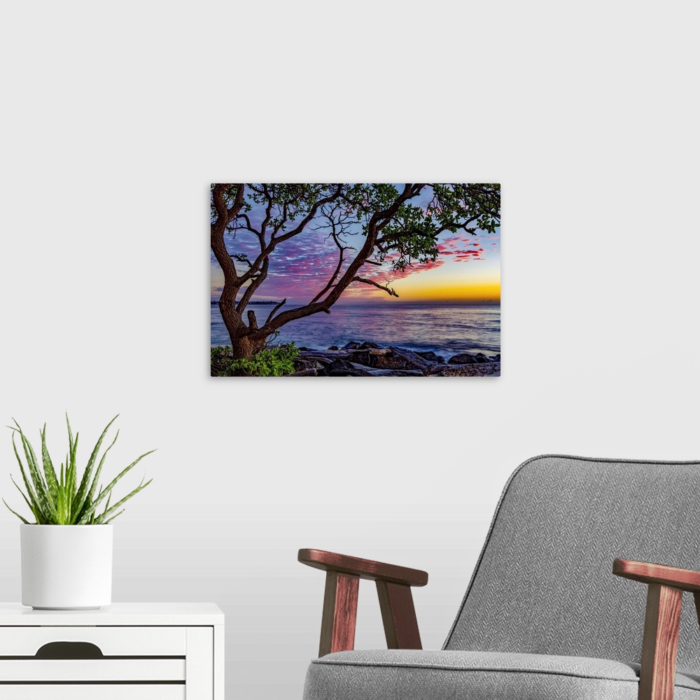 A modern room featuring Lydgate Beach at sunrise; Kapaa, Kauai, Hawaii, United States of America