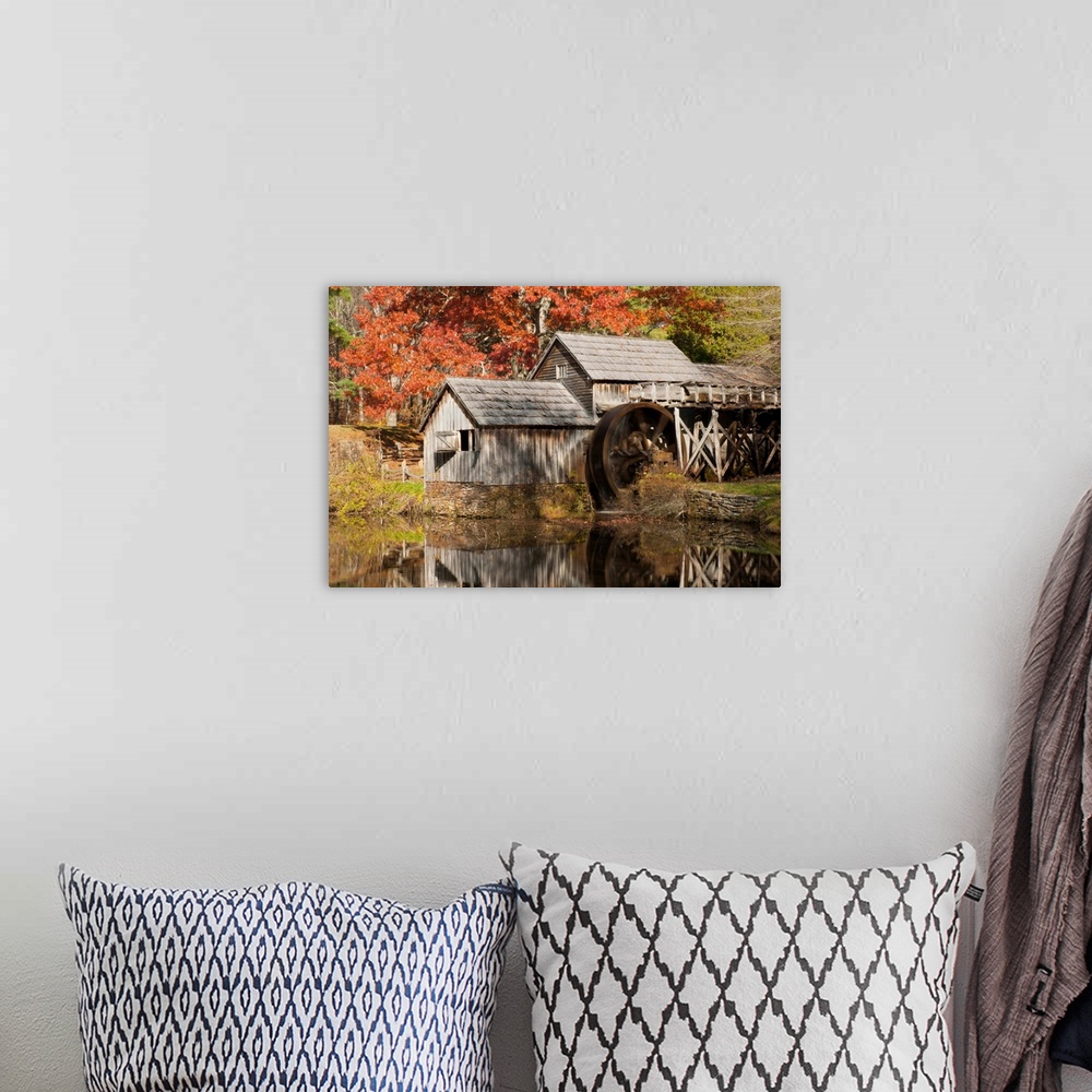 A bohemian room featuring Mabry Mill and pond in autumn.