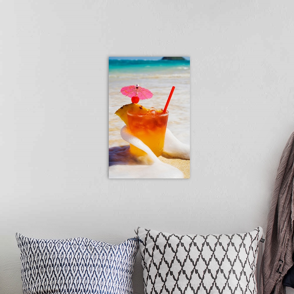 A bohemian room featuring Mai Tai Getting Splashed By A Wave As It Rest On The Beach