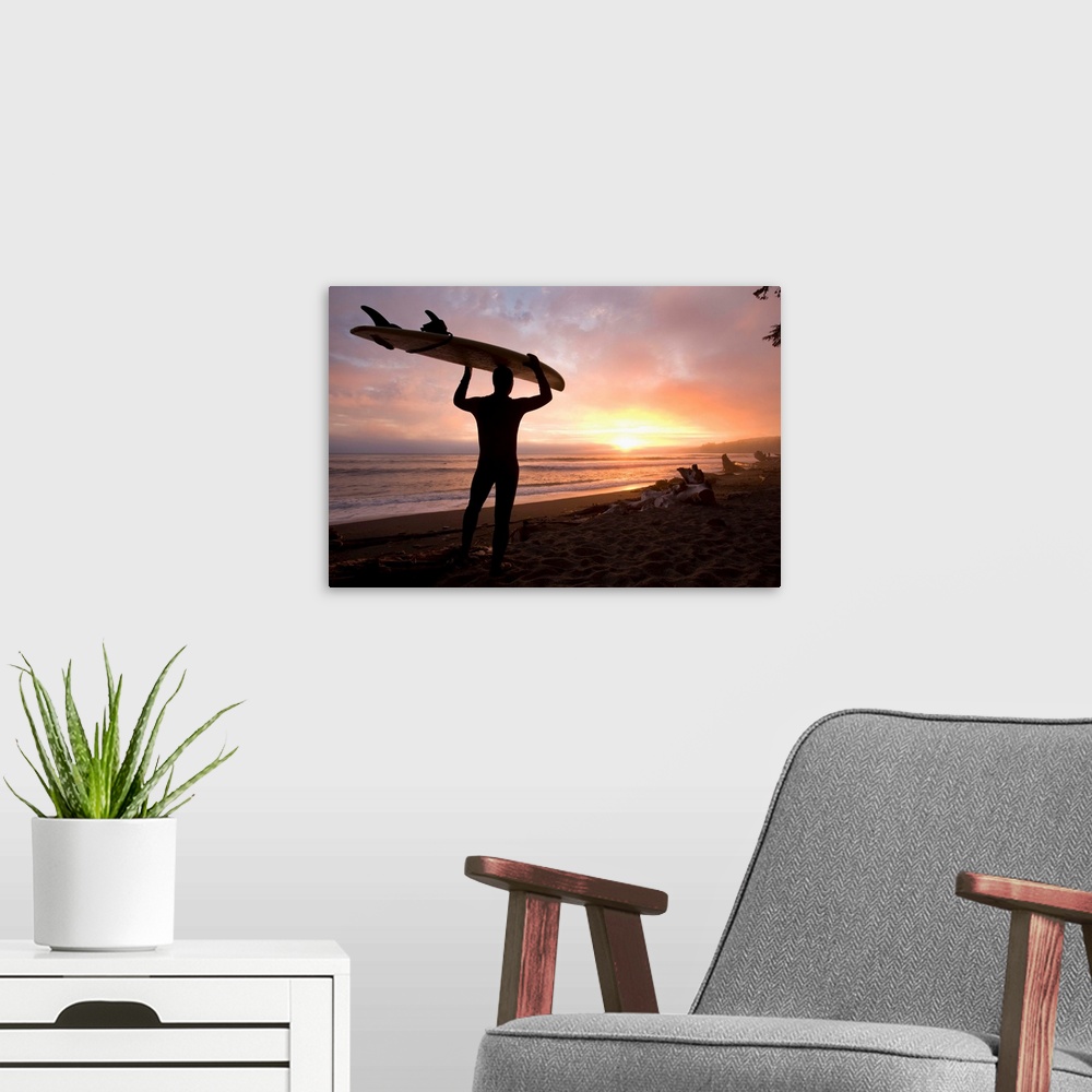 A modern room featuring Man Carrying Surfboard, Sombrio Beach, Vancouver Island, BC, Canada