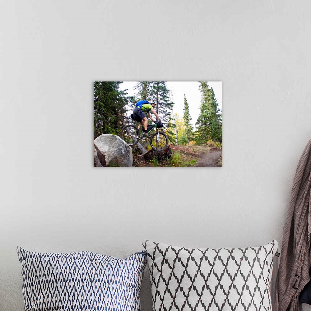 A bohemian room featuring Man Mountain Biking Over Rocks, Anchorage Hillside Trails, Alaska