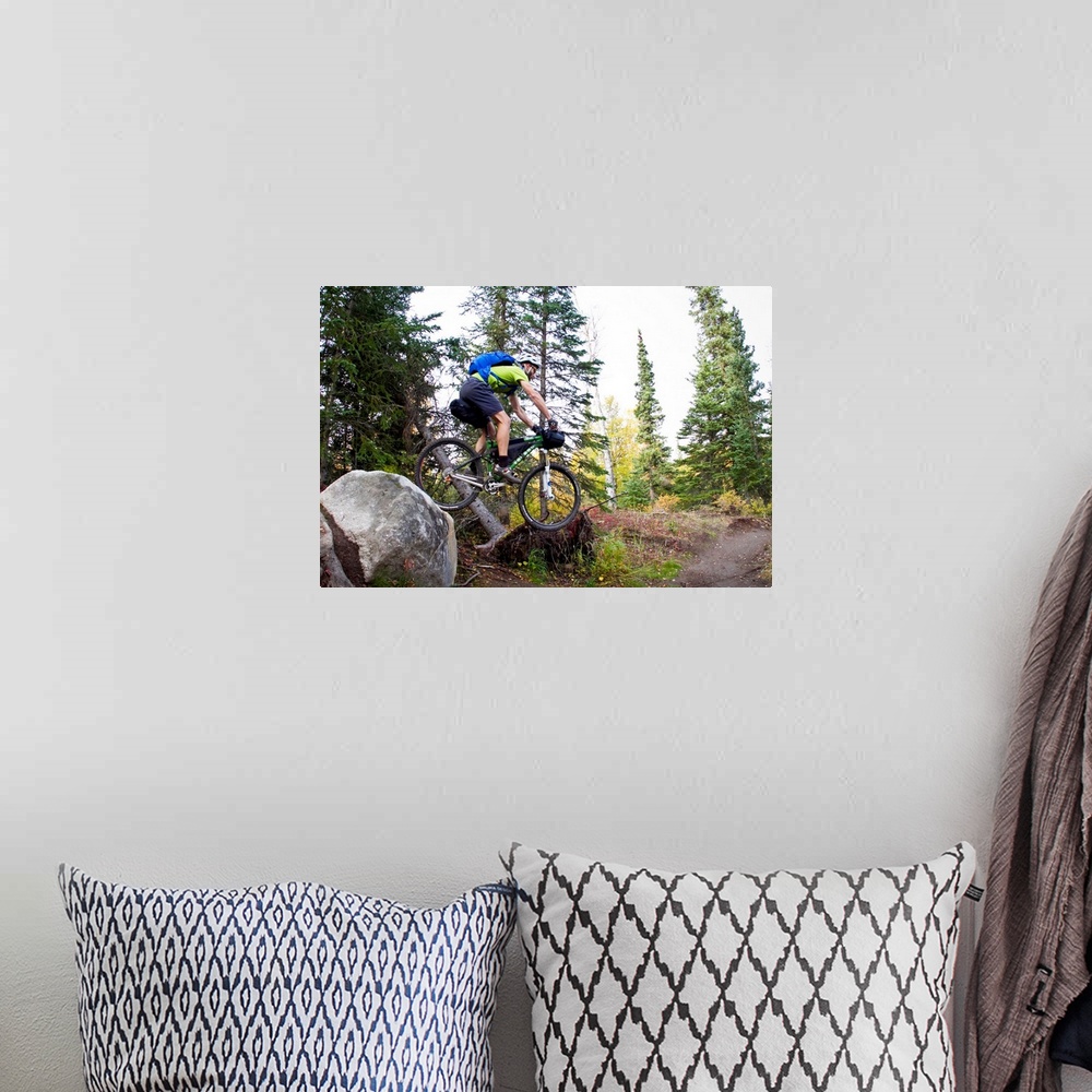A bohemian room featuring Man Mountain Biking Over Rocks, Anchorage Hillside Trails, Alaska