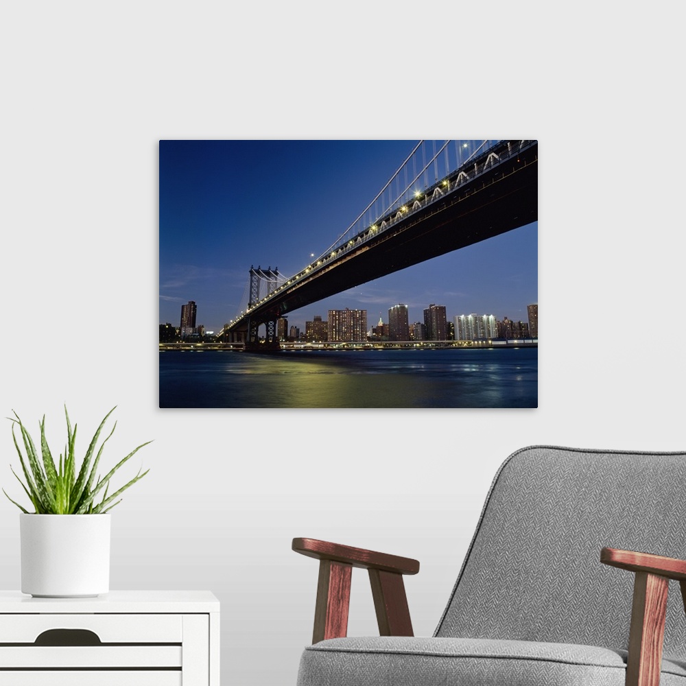 A modern room featuring Manhattan Bridge At Dusk With The Empire State Building Behind; New York City, New York