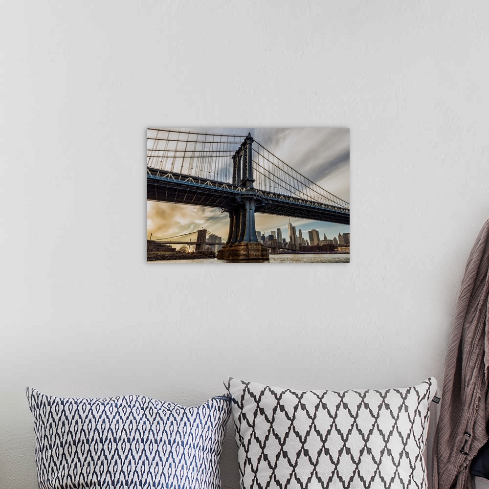 A bohemian room featuring Manhattan Bridge at sunset, Brooklyn Bridge Park; Brooklyn, New York, United States of America