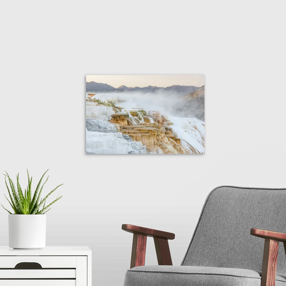 A modern room featuring Mineral deposits and steam vapors of Canary Spring at the Mammoth Hot Springs in Yellowstone Natu...