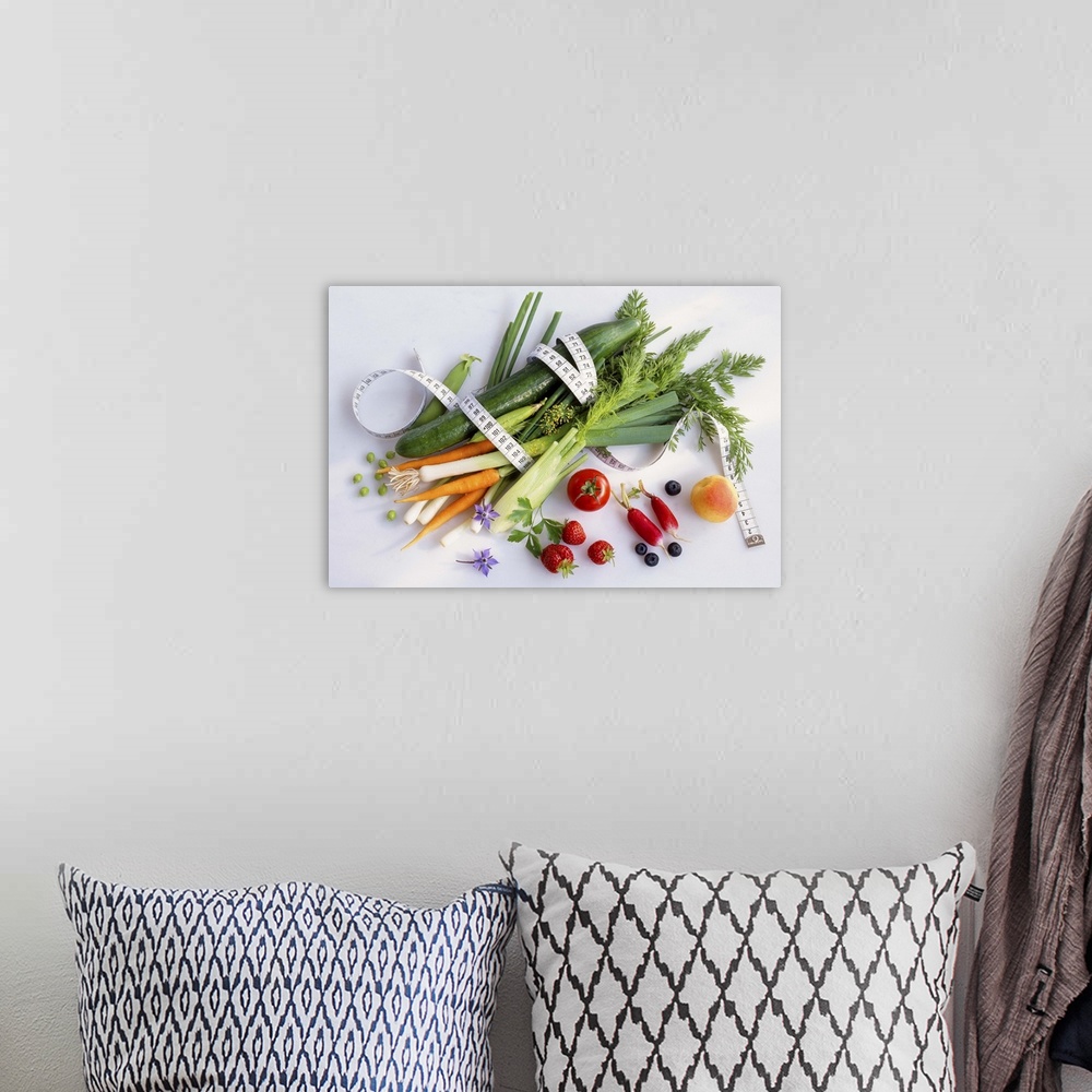 A bohemian room featuring Mixed fruit and vegetable still-life with a measuring tape