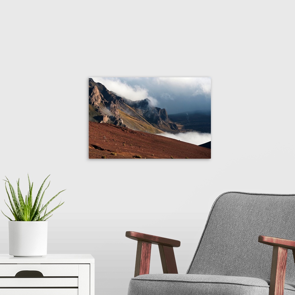 A modern room featuring Morning clouds begin to burn off of Haleakala National Park; Maui, Hawaii, United States of America