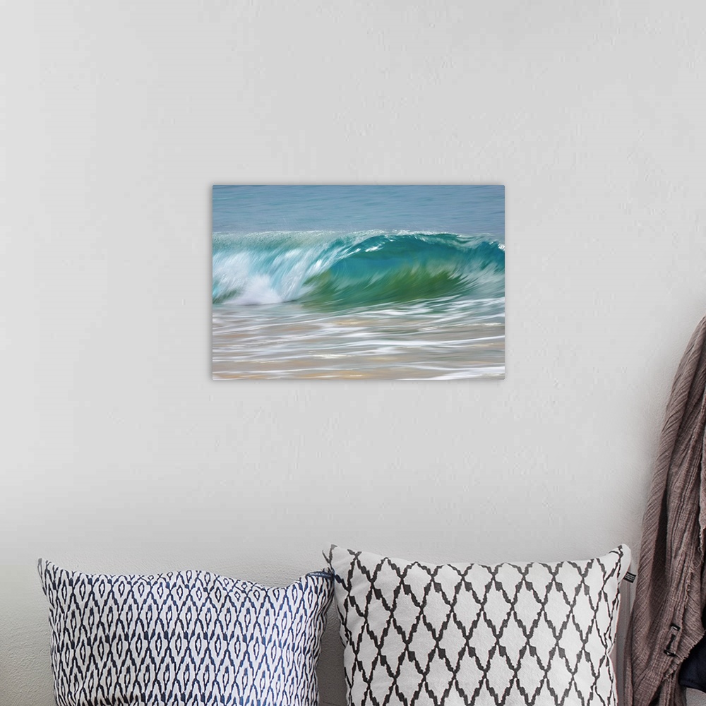A bohemian room featuring Motion blur of blue rolling waves rolling into the golden sand at the shore; Kihei, Maui, Hawaii,...