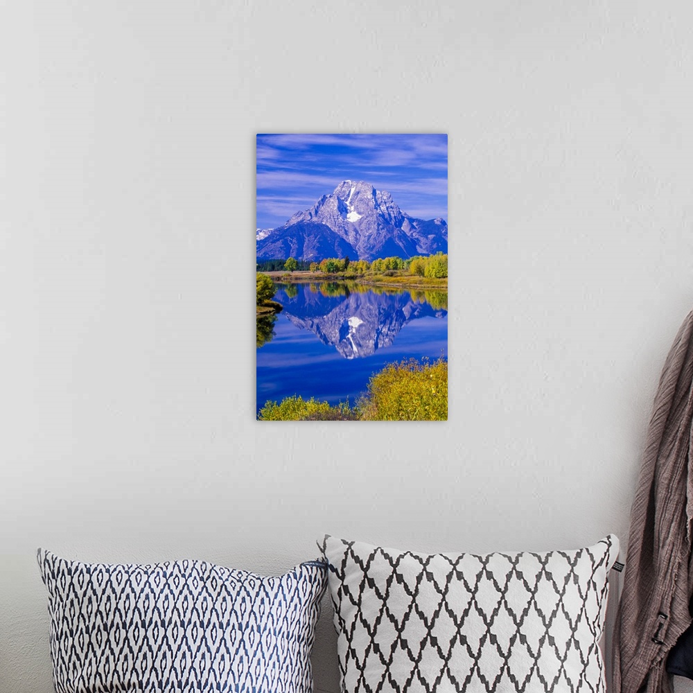 A bohemian room featuring Mount Moran of the Grand Tetons reflected in Snake River in Grand Teton National Park in autumn W...