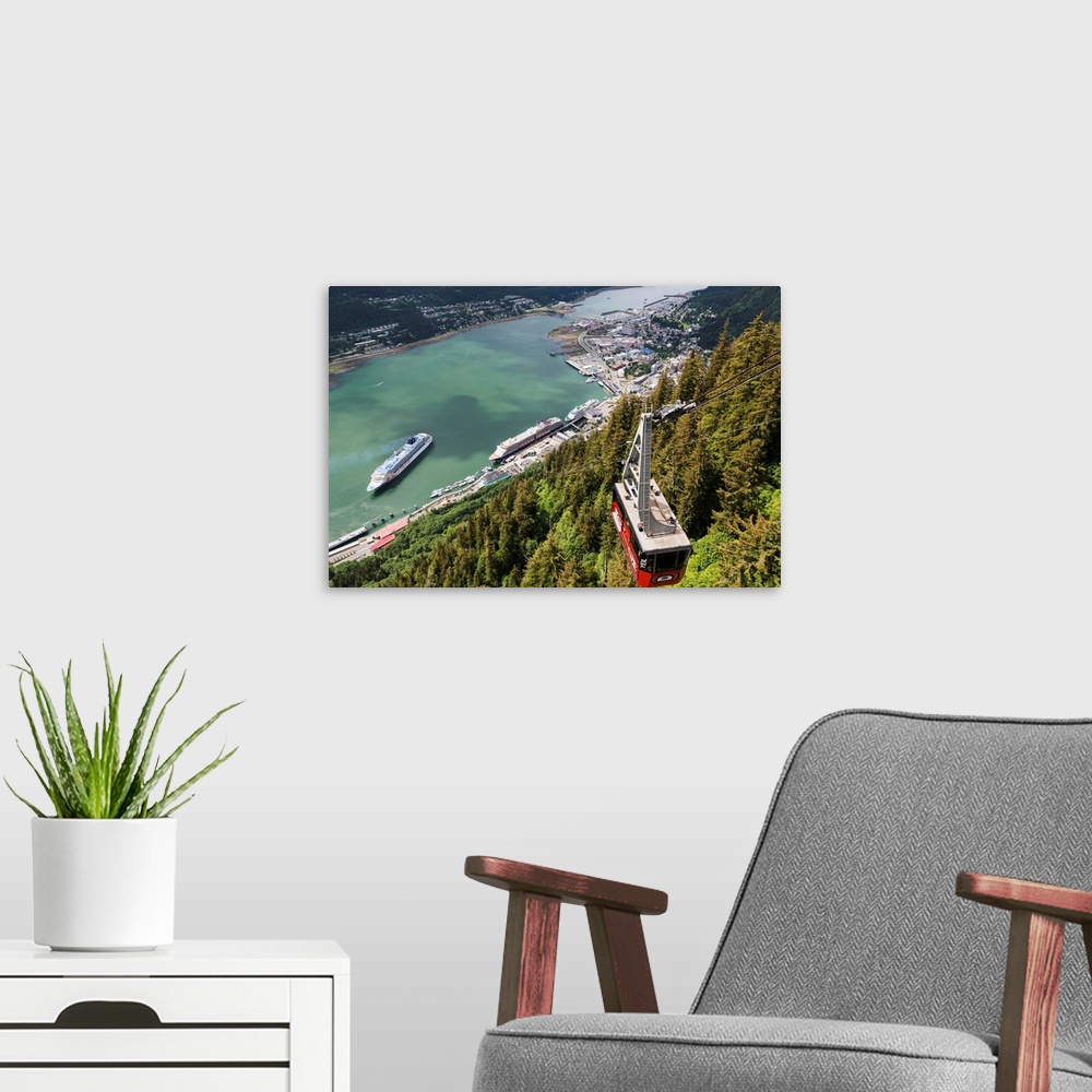 A modern room featuring View of the Mount Roberts Tramway above Juneau and cruise ships in Gastineau Channel, Alaska.