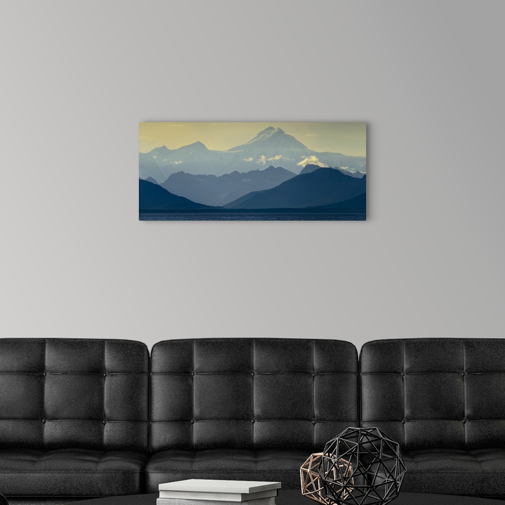 A modern room featuring Mountain peak and foothills at sunrise in  Glacier Bay National Park and Preserve, Inside Passage...