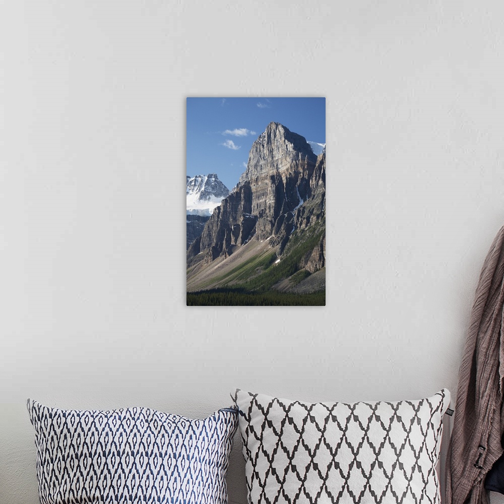 A bohemian room featuring Mountain Peaks With Cliff Face And Blue Sky; Alberta, Canada