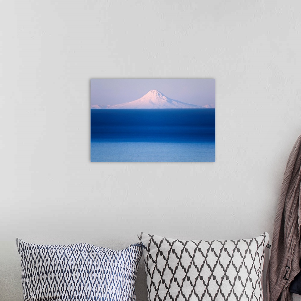 A bohemian room featuring Mt. Augustine seen across Cook Inlet from the Kenai Peninsula