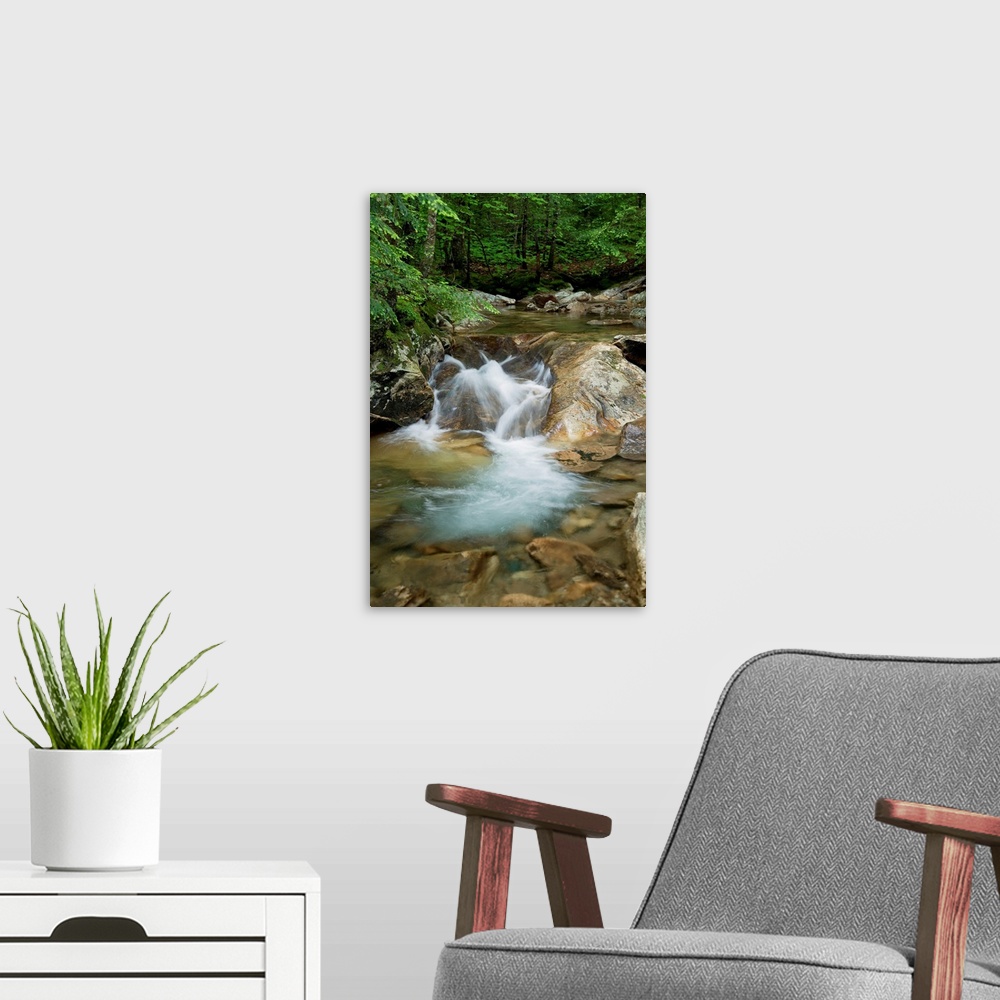 A modern room featuring New England, New Hampshire, White Mountains, A Rocky Riverbed And Waterfall