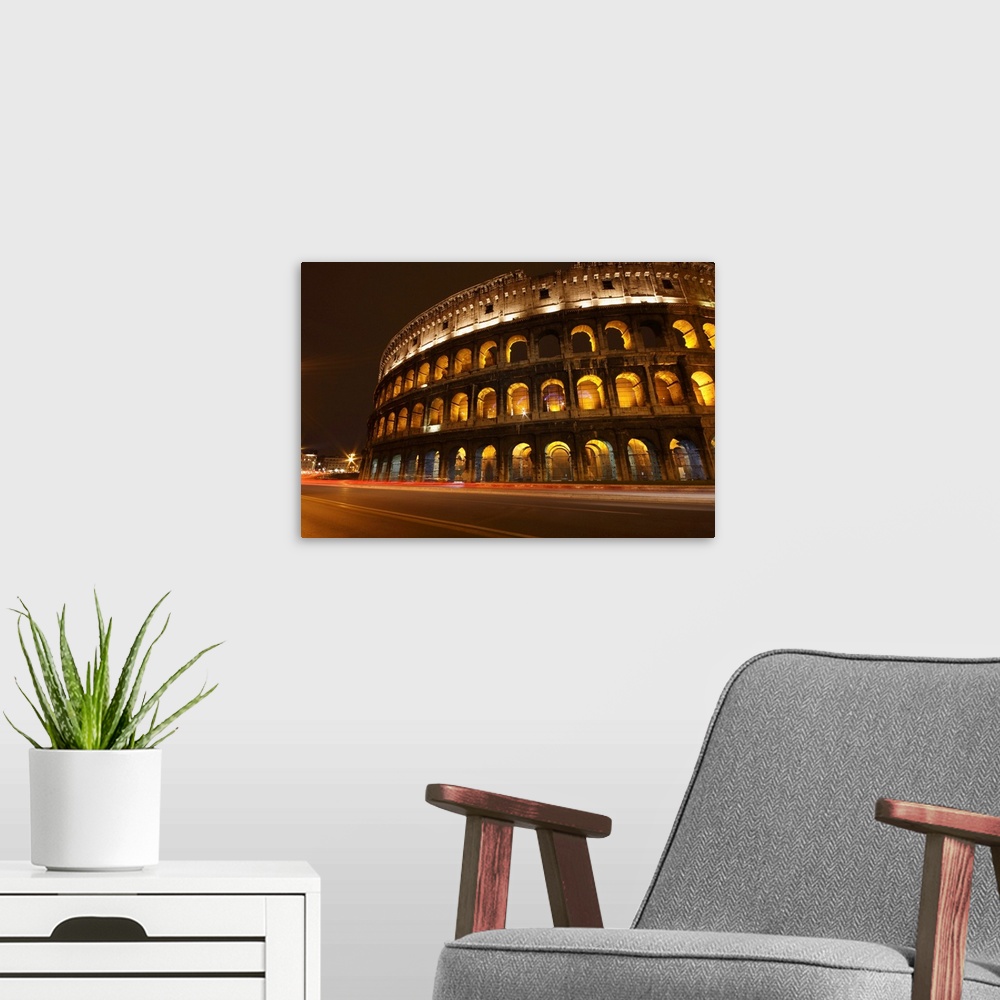 A modern room featuring Night Lights Of The Colosseum; Rome Lazio Italy