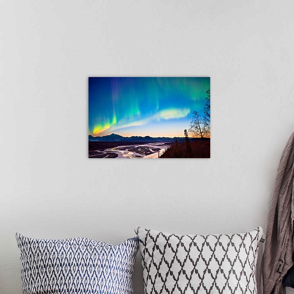 A bohemian room featuring Northern Lights in the sky above Mount McKinley and the Alaska range at twilight with the glow fr...