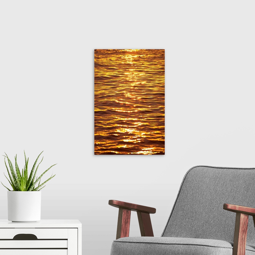 A modern room featuring Ocean Texture Ripples At Sunset, Golden Yellow Waters
