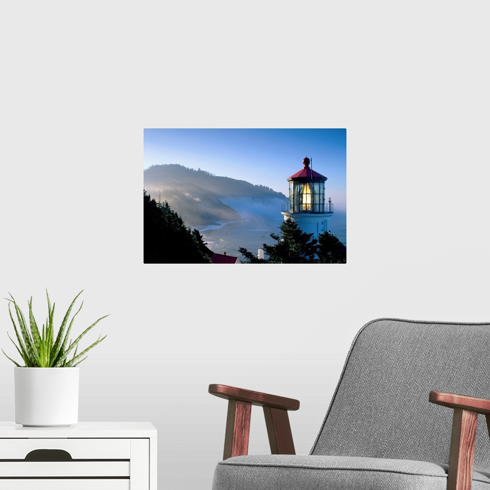 A modern room featuring Landscape, close up photograph of the top of Heceta Head Lighthouse, overlooking the coastline as...