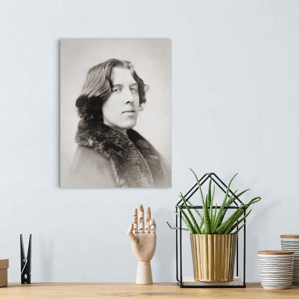 A bohemian room featuring Oscar Wilde, 1854 - 1900. Irish poet and playwright. After a photogaph made in the early 1880's b...
