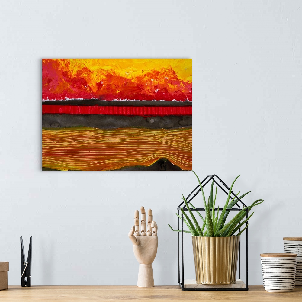 A bohemian room featuring Painting of a colourful sunset reflected in water and the horizon.