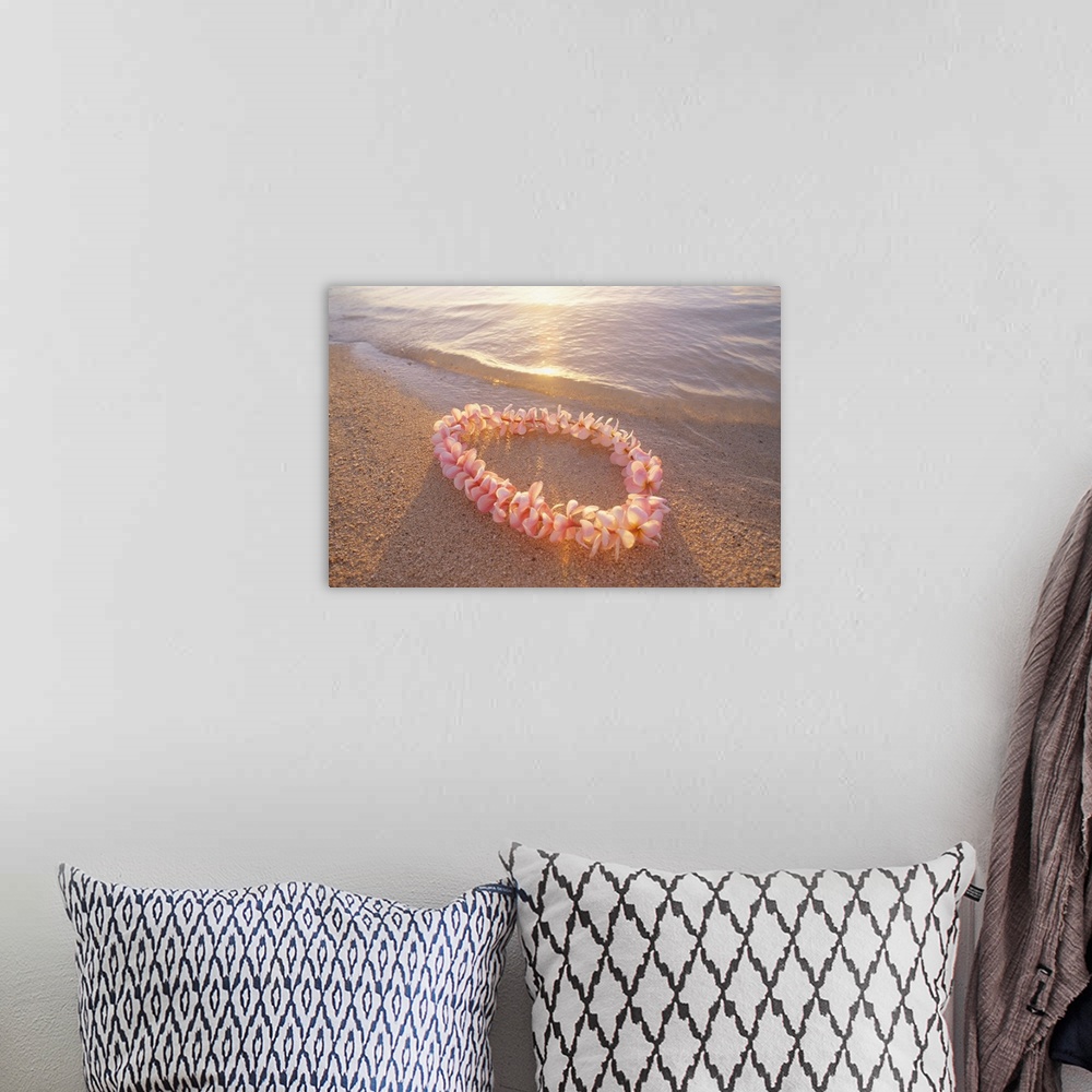 A bohemian room featuring Pale Pink Plumeria Lei In Shoreline Waters With Golden Sunset Reflections