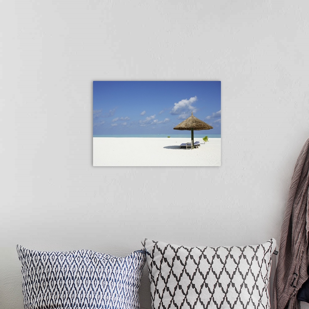 A bohemian room featuring Palm Hut on beach, Cocoa Island, Maldives