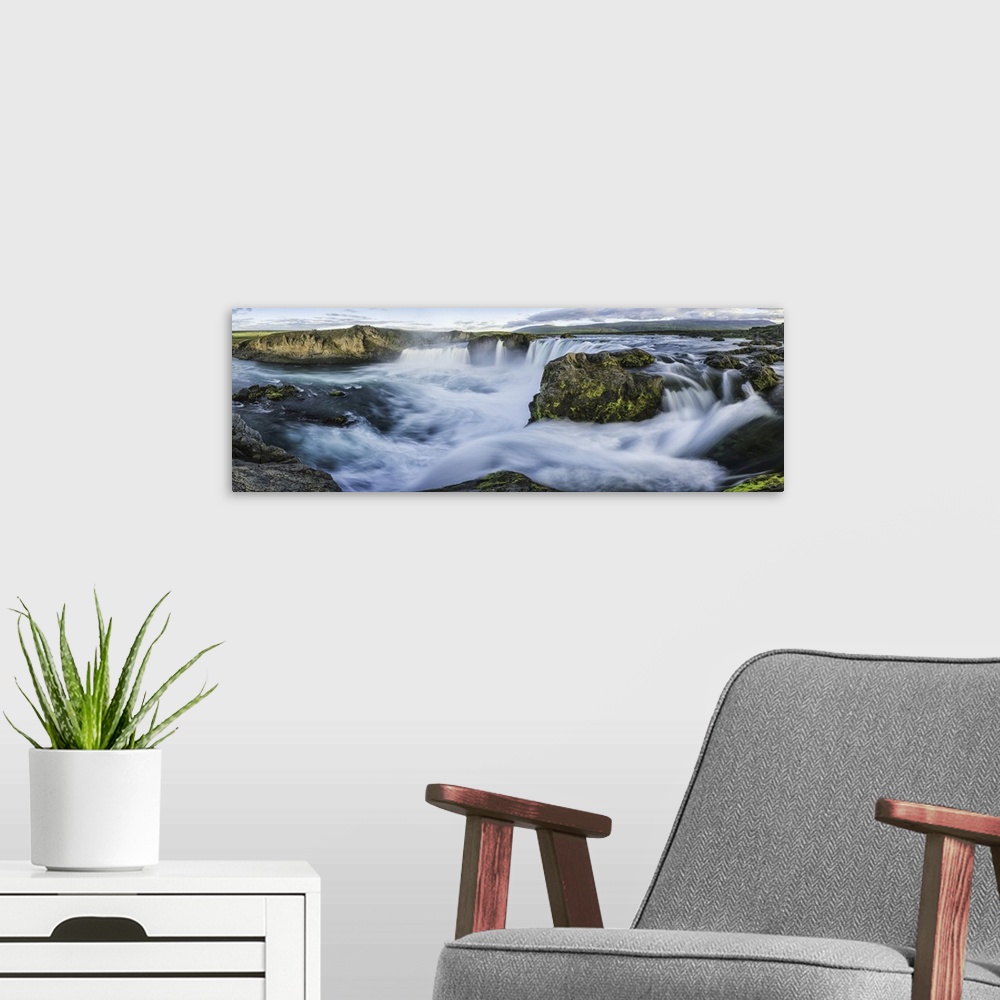 A modern room featuring Panoramic image of Godafoss waterfall, Iceland.