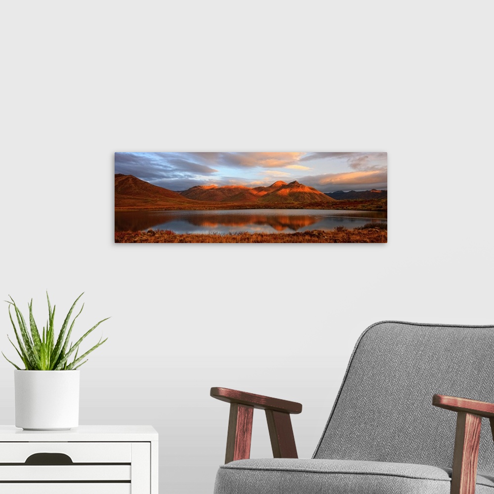 A modern room featuring Panoramic Of Sunrise Over Mount Adney Reflected In A Pond In Fall, Yukon, Canada