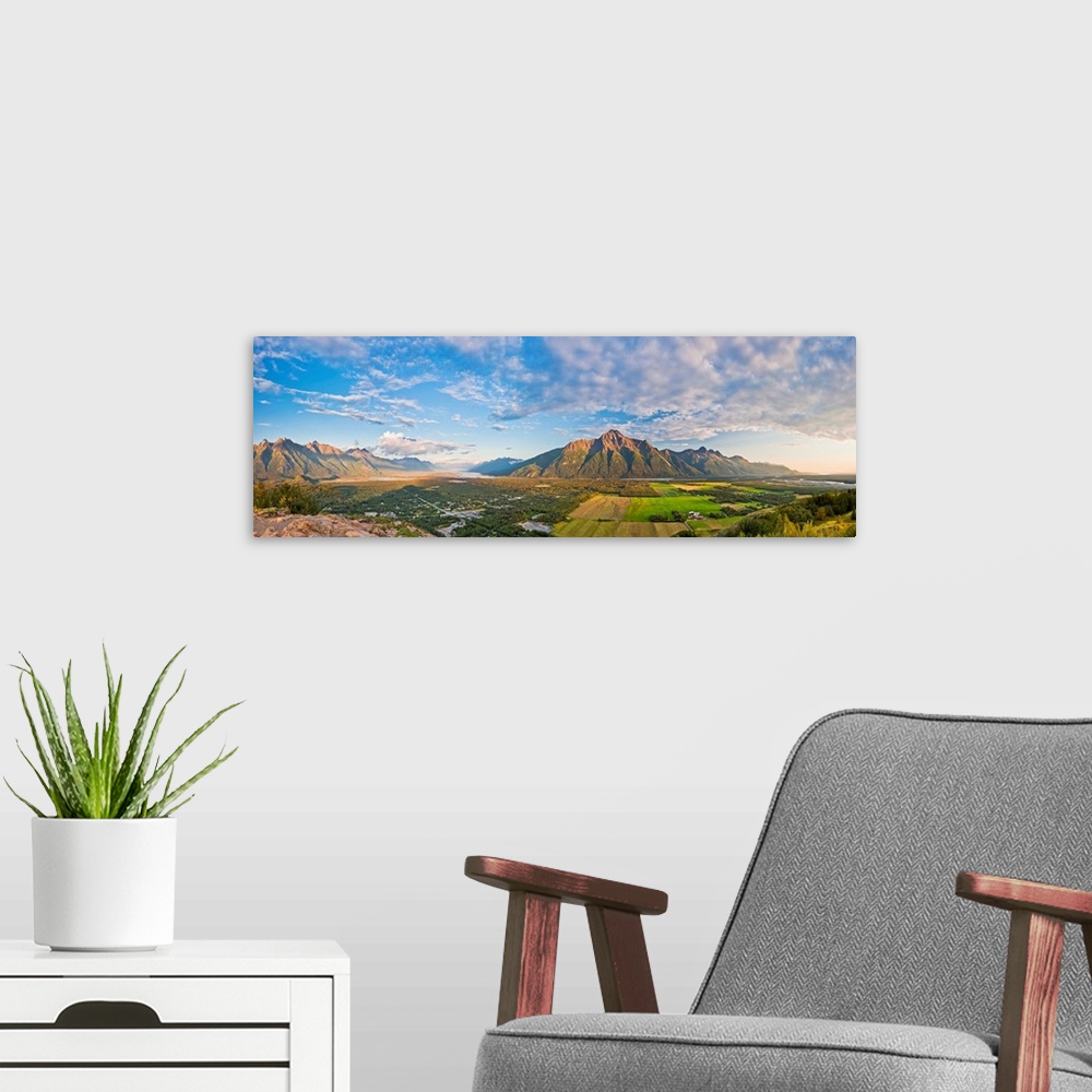 A modern room featuring Panoramic view from the top of the Butte of Matanuska Peak, Pioneer Peak and the Knik River in th...