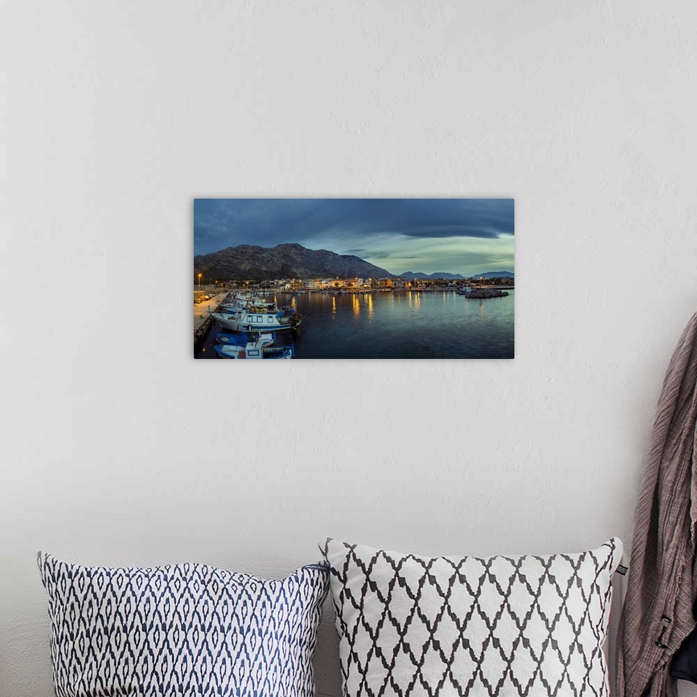 A bohemian room featuring Panoramic view of the harbour at twilight.