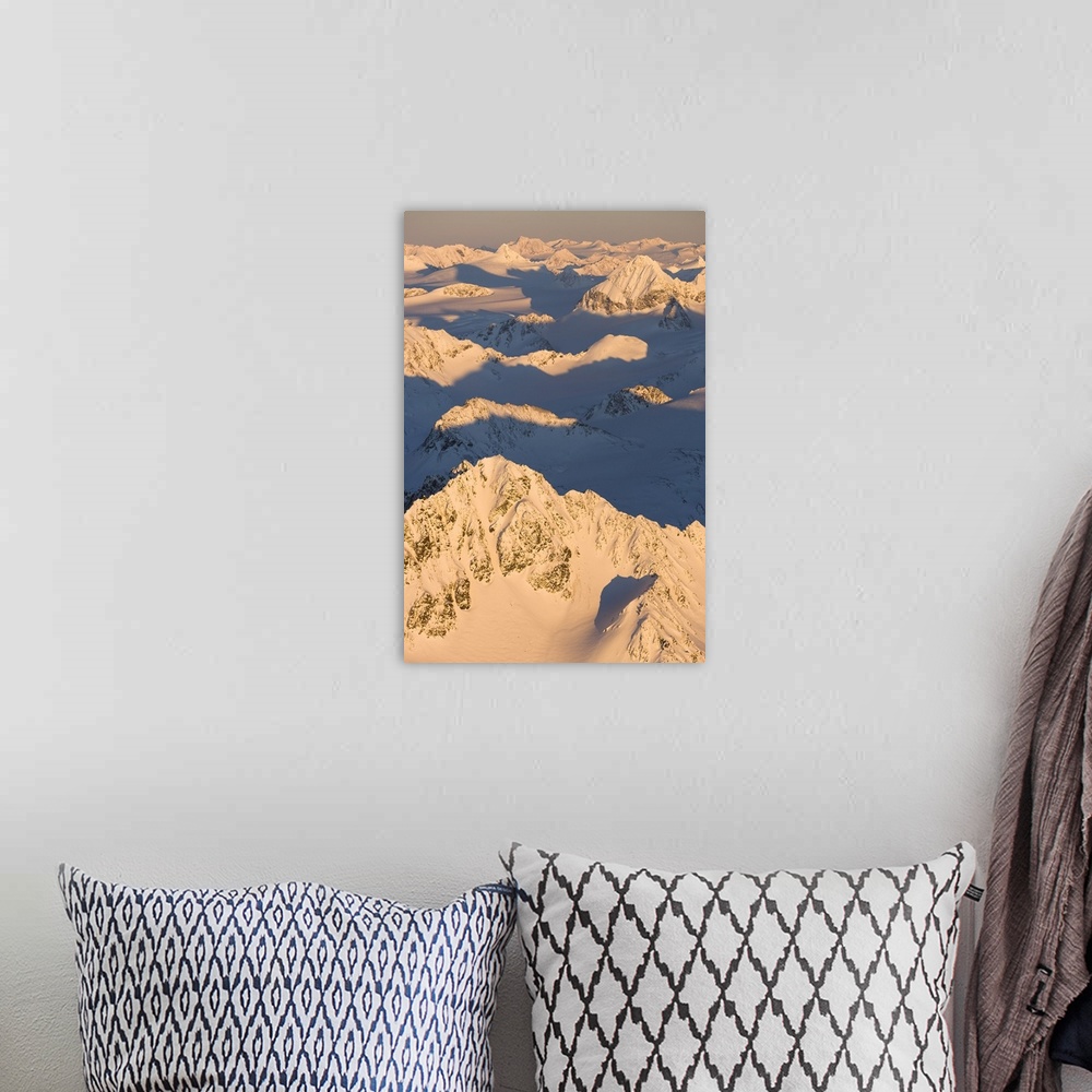 A bohemian room featuring Peaks Of A Snow Covered Mountain Range Glowing Pink At Sunset, Kachemak Bay State Park; Alaska, U...