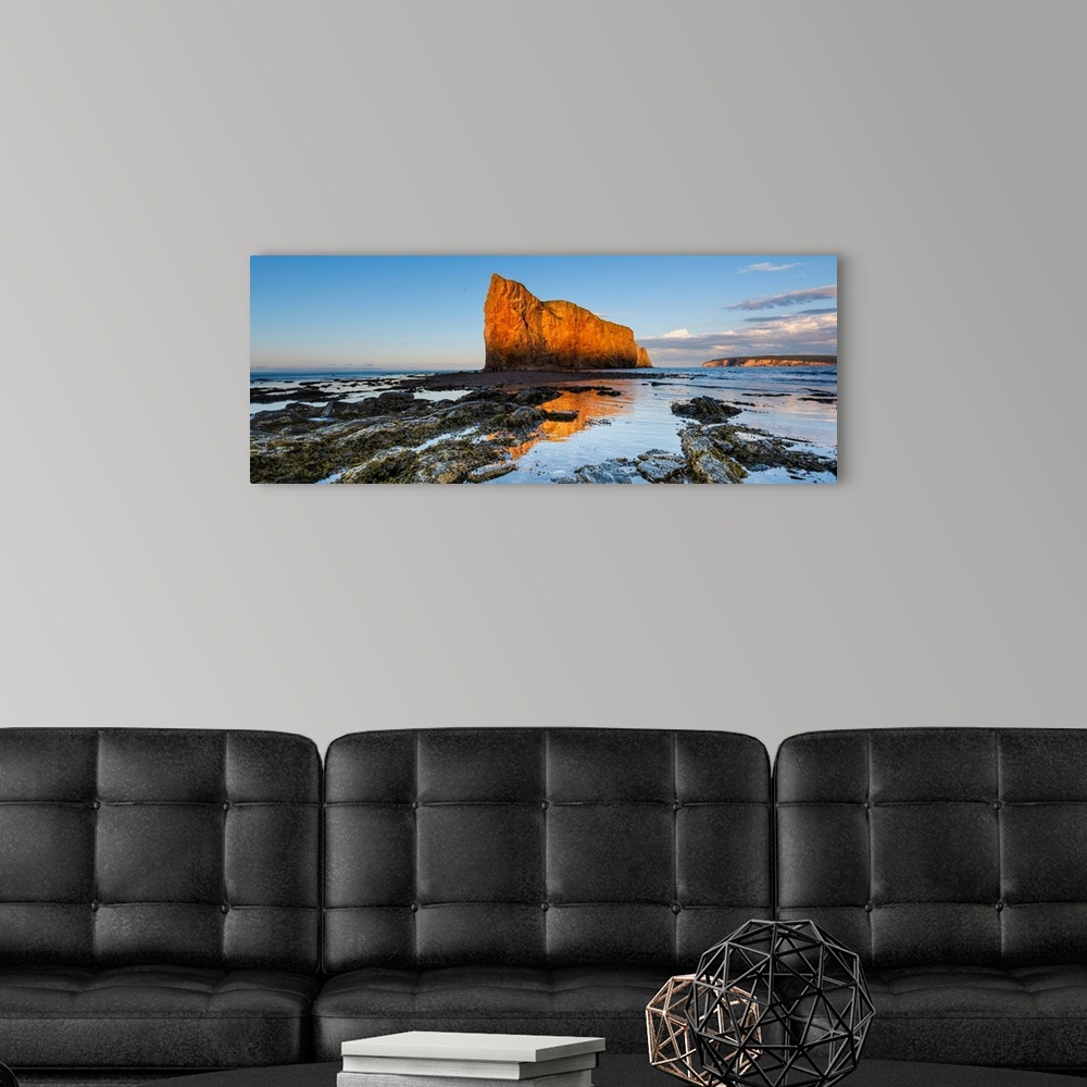 A modern room featuring Perce Rock in the Gulf of Saint Lawrence, Bonaventure Island and Perce Rock National Park, Perce,...