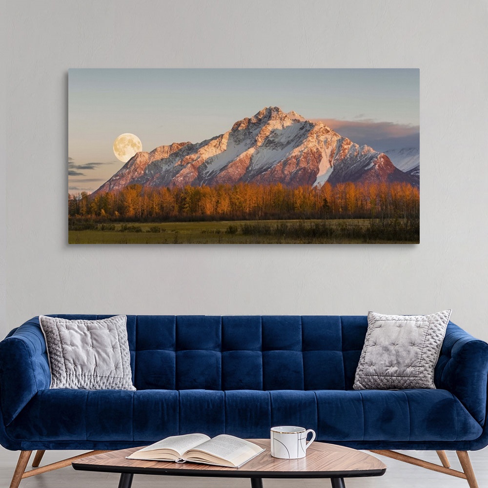 A modern room featuring Scenic sunset view of Pioneer Peak with the full moon rising over the Palmer Hay Flats, Alaska, A...