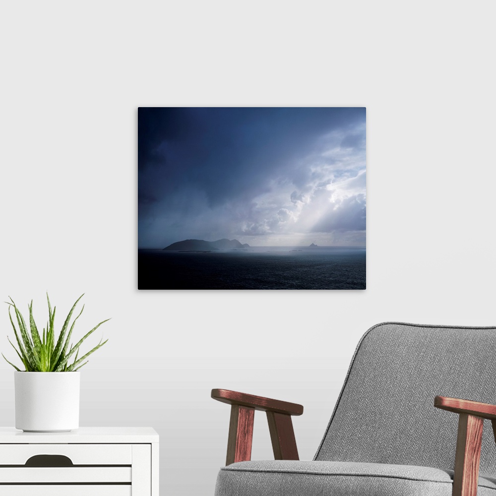 A modern room featuring Rainclouds over Blasket islands, co Kerry, Ireland.