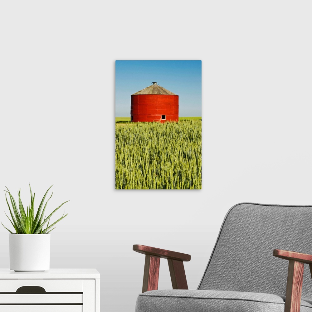 A modern room featuring Red Grain Bin In Wheat Field, Sceptre, Saskatchewan, Canada